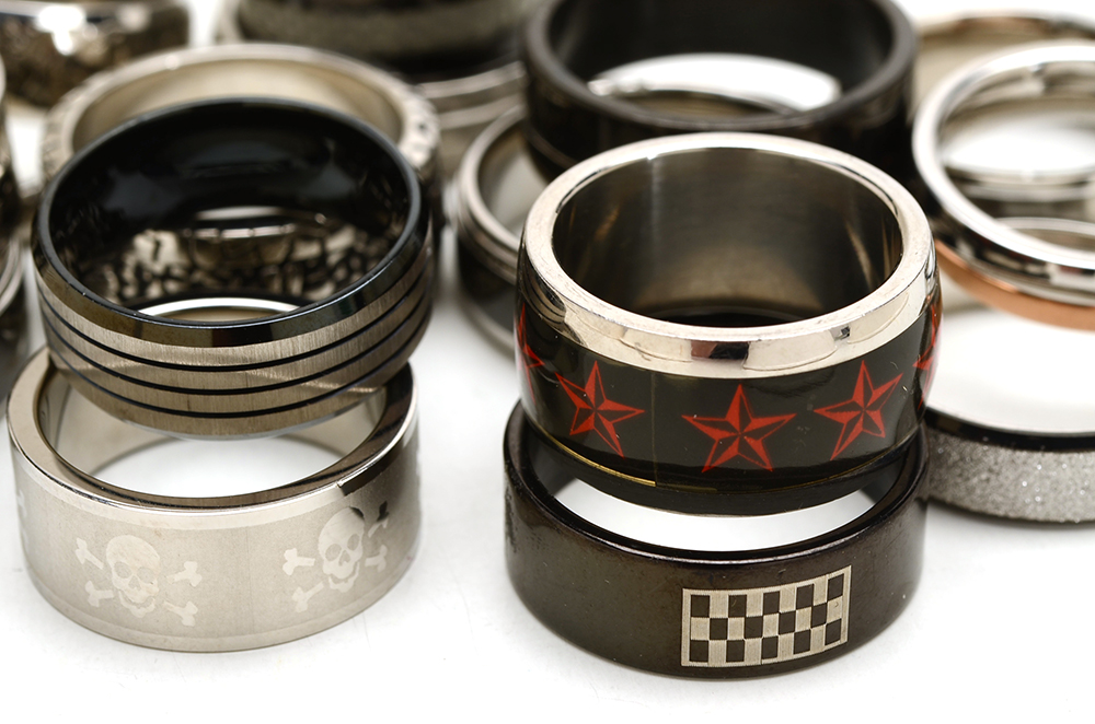 Group of Sixteen Stainless Steel Men's Rings