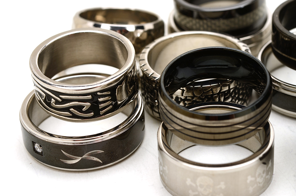 Group of Sixteen Stainless Steel Men's Rings