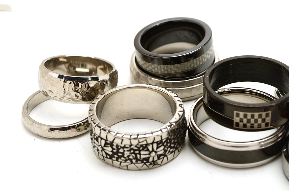 Group of Sixteen Stainless Steel Men's Rings