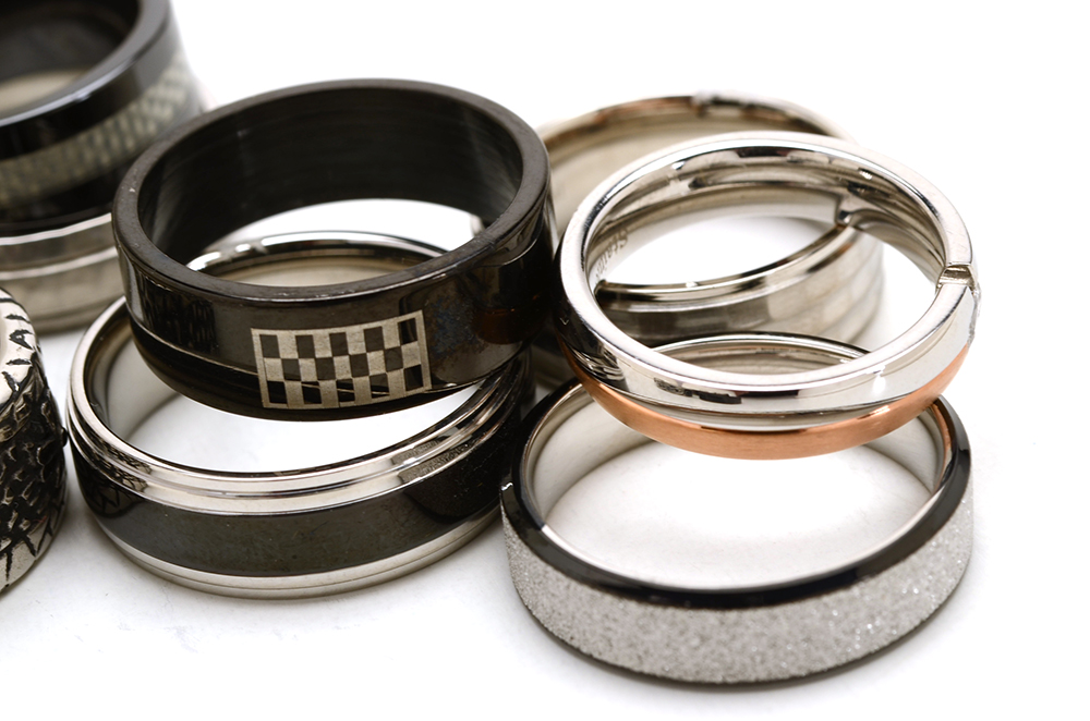Group of Sixteen Stainless Steel Men's Rings