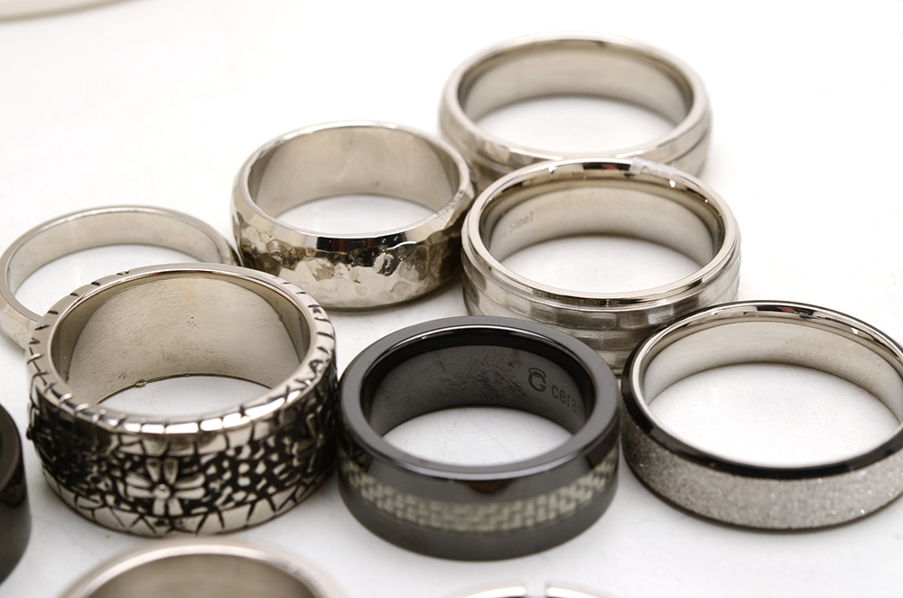 Group of Sixteen Stainless Steel Men's Rings