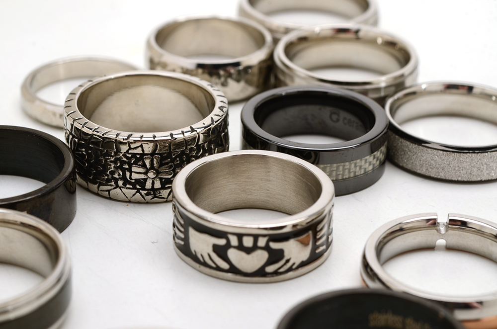 Group of Sixteen Stainless Steel Men's Rings