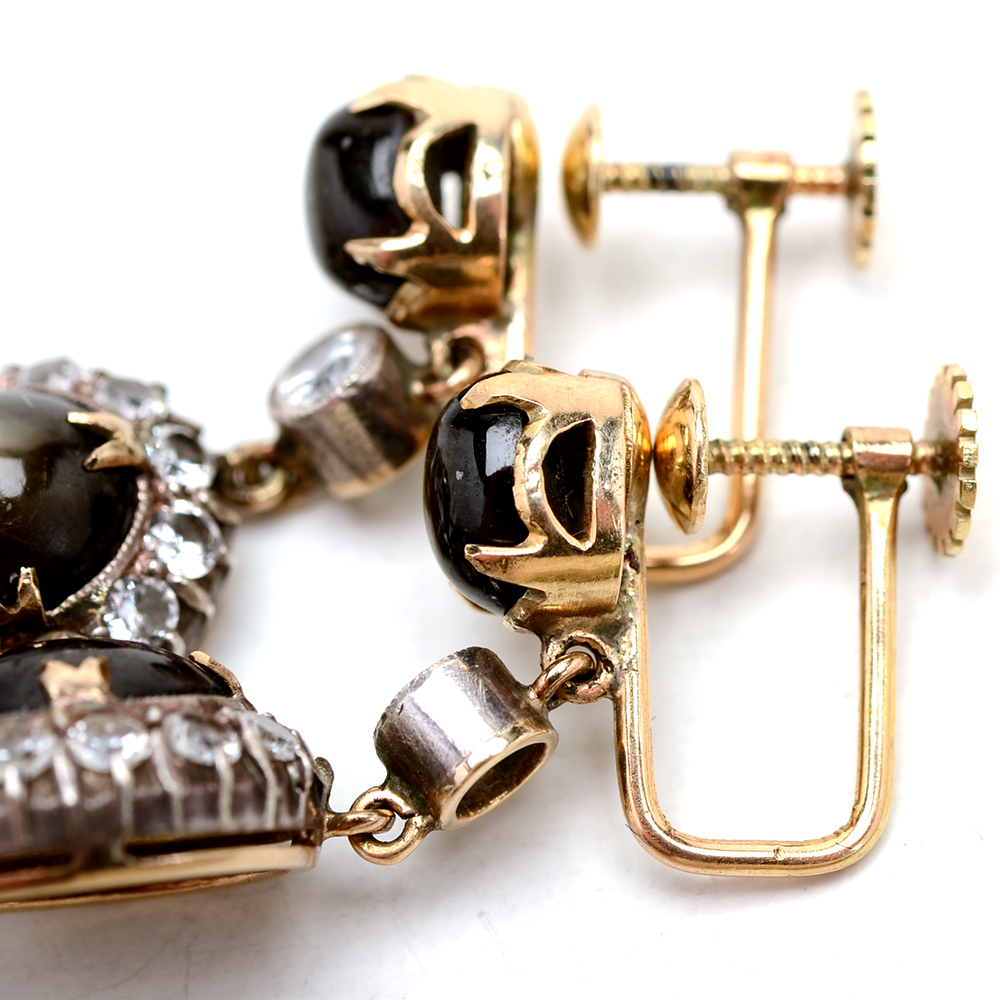 Pair of 14K Yellow Gold Black Star Sapphire White Zircon Earrings
