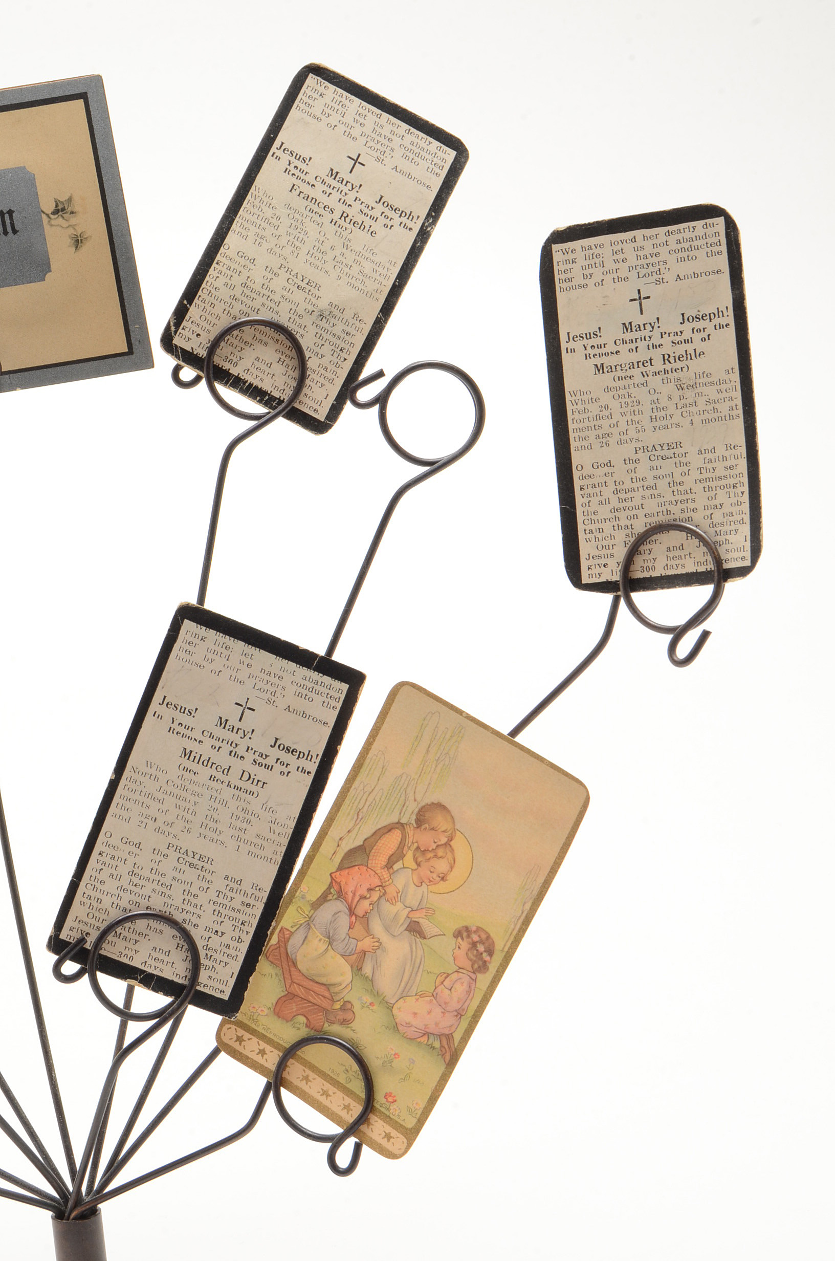 Pair of Metal Card Holders Displaying In Memoriam Prayer Cards