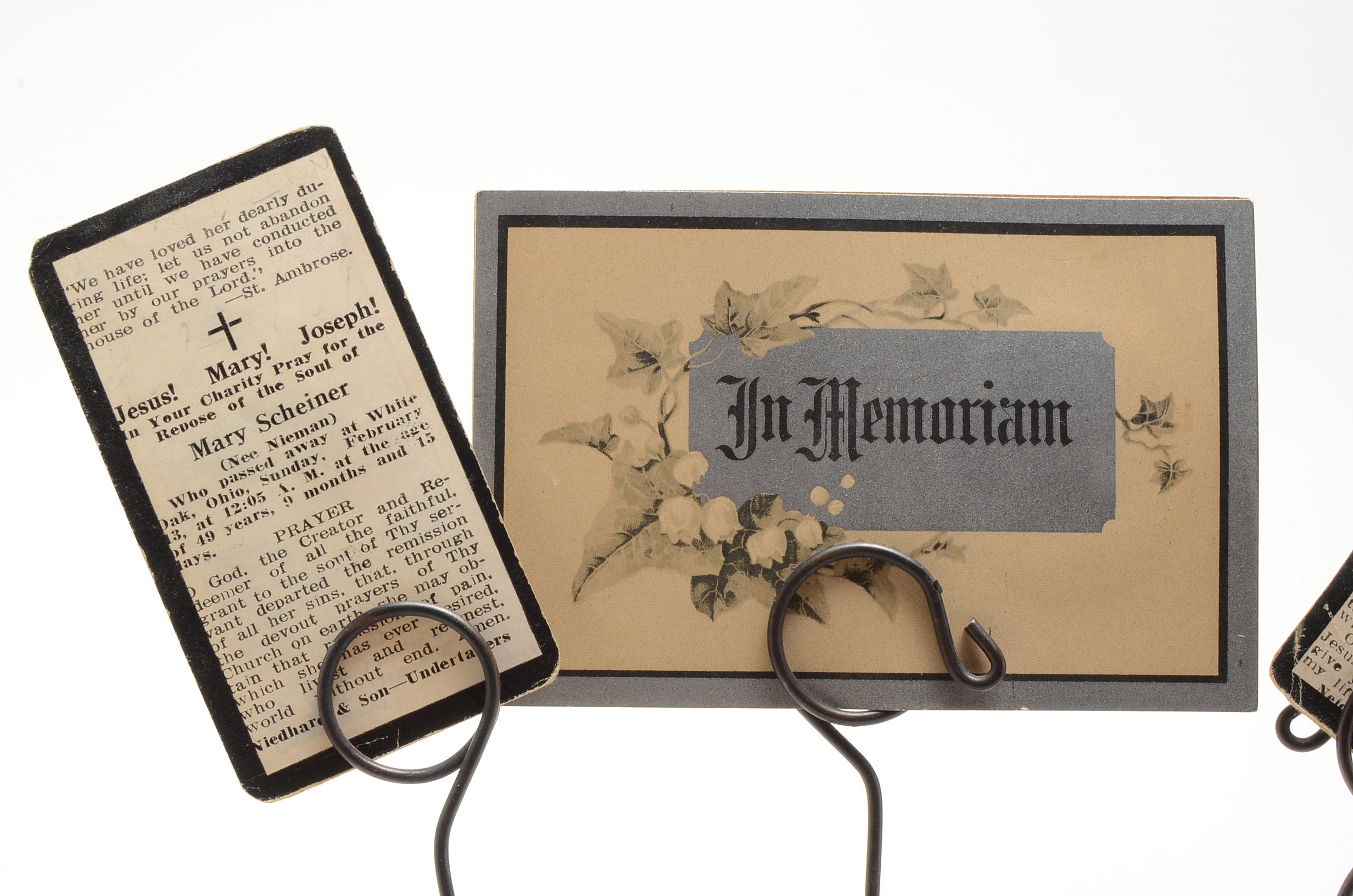 Pair of Metal Card Holders Displaying In Memoriam Prayer Cards