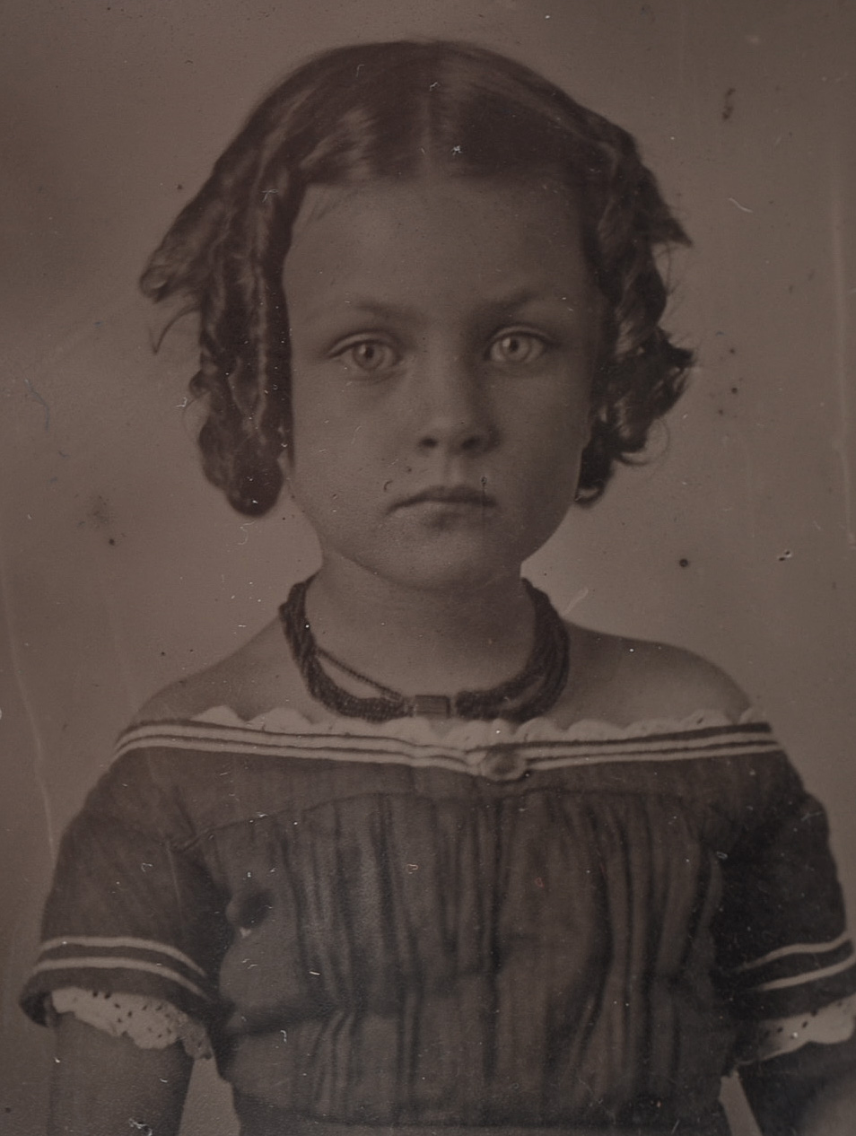 Early Portrait Photographs and Cast Iron Parasol Hook