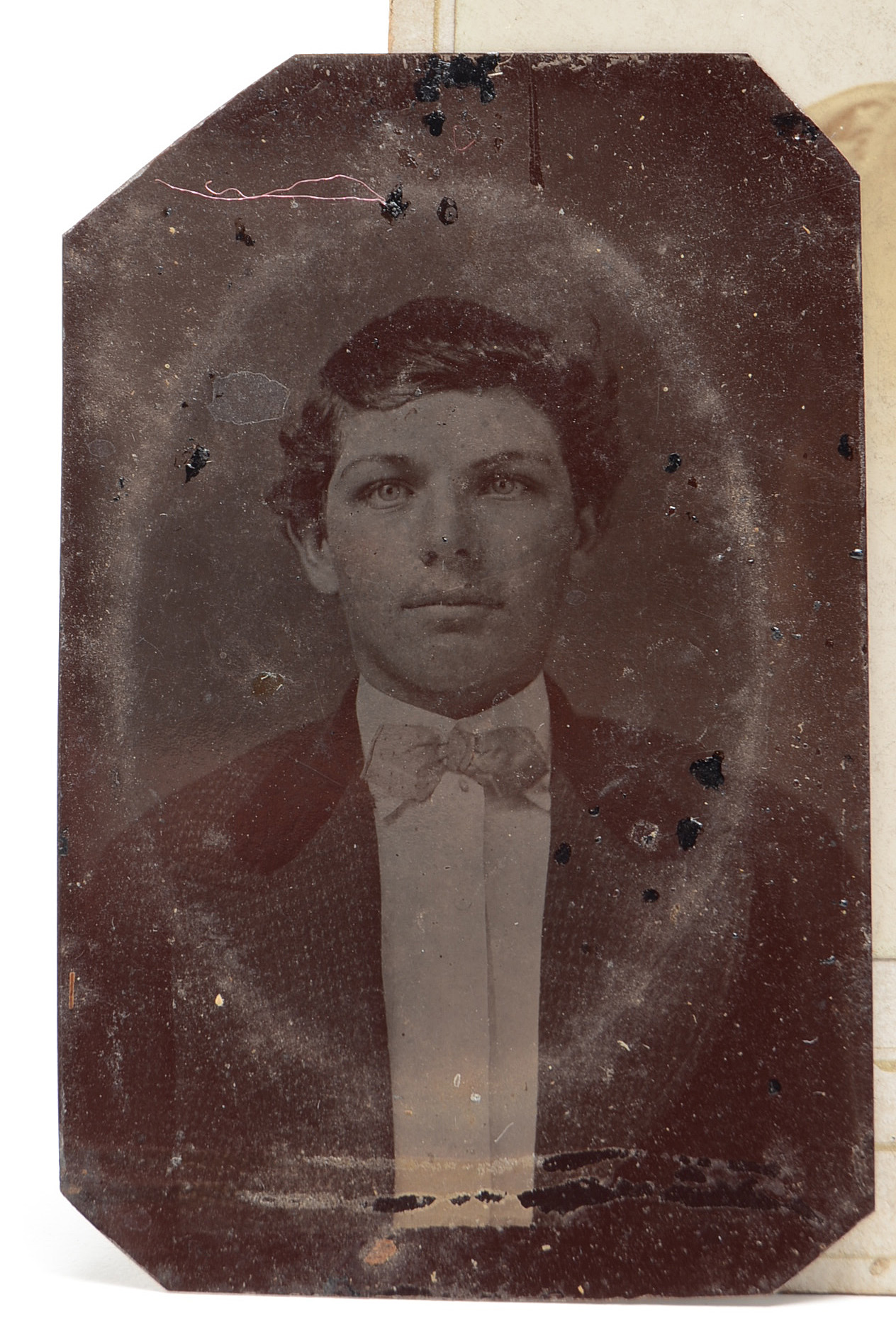 Early Portrait Photographs and Cast Iron Parasol Hook