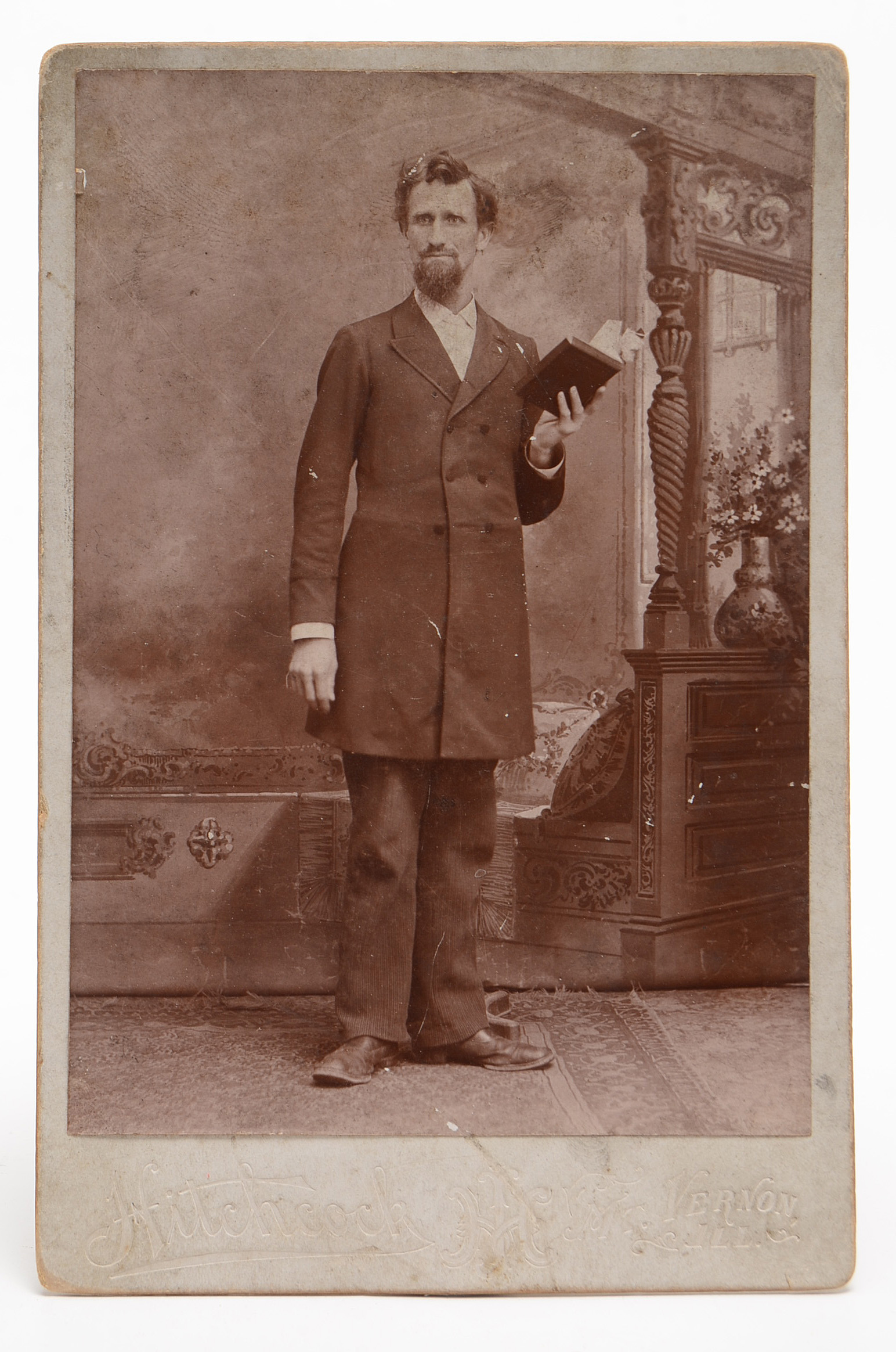 Early Portrait Photographs and Cast Iron Parasol Hook
