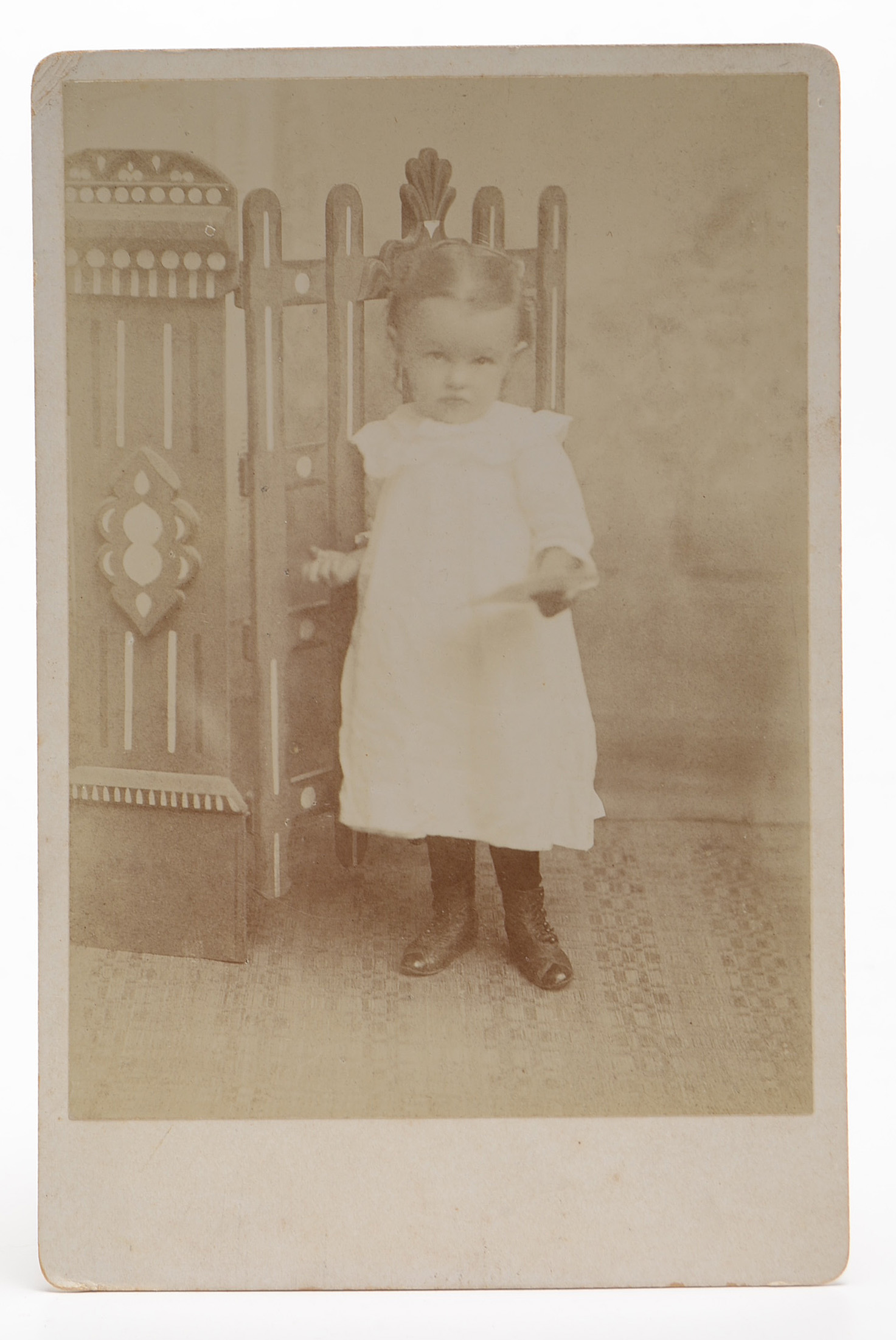 Early Portrait Photographs and Cast Iron Parasol Hook