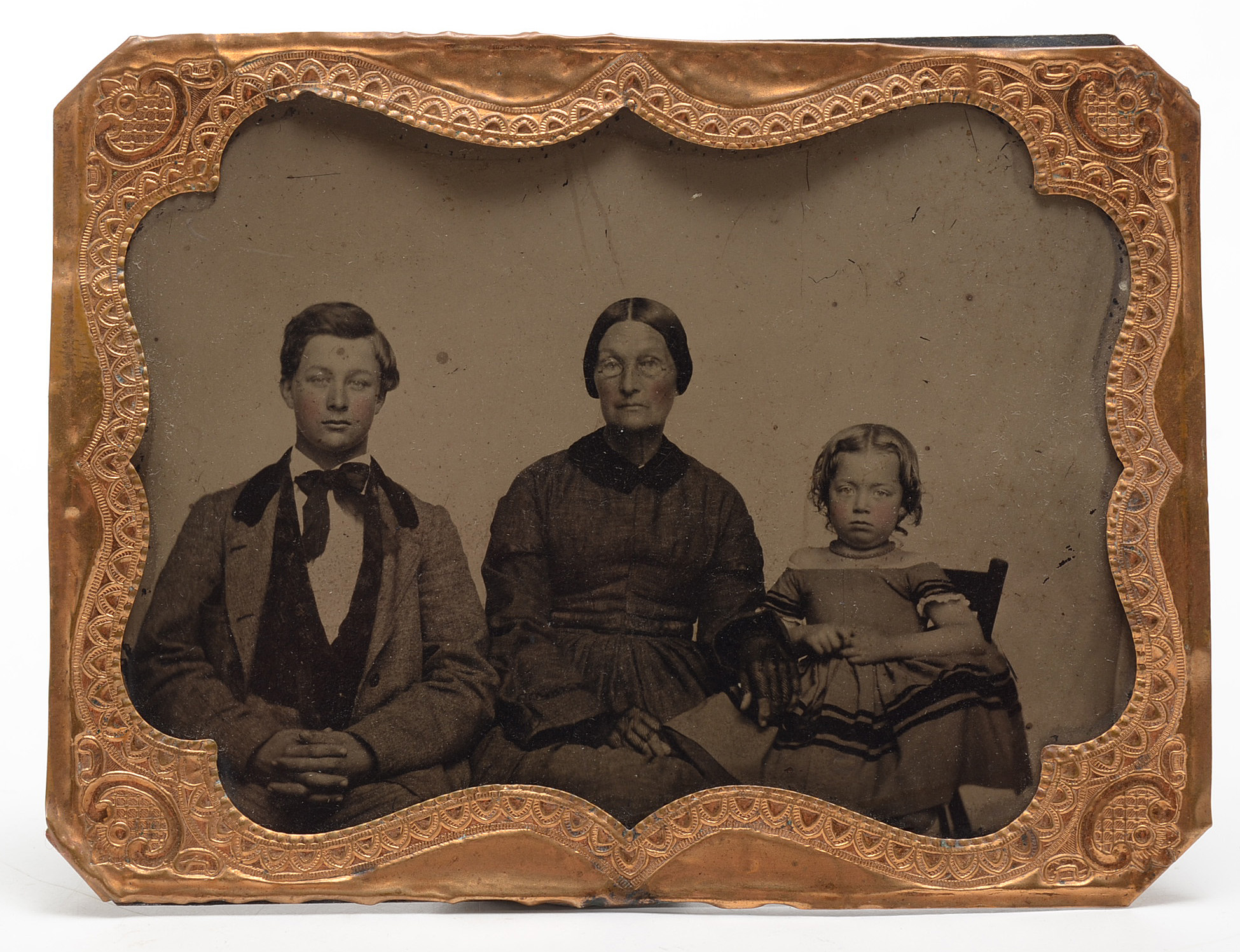 Early Portrait Photographs and Cast Iron Parasol Hook