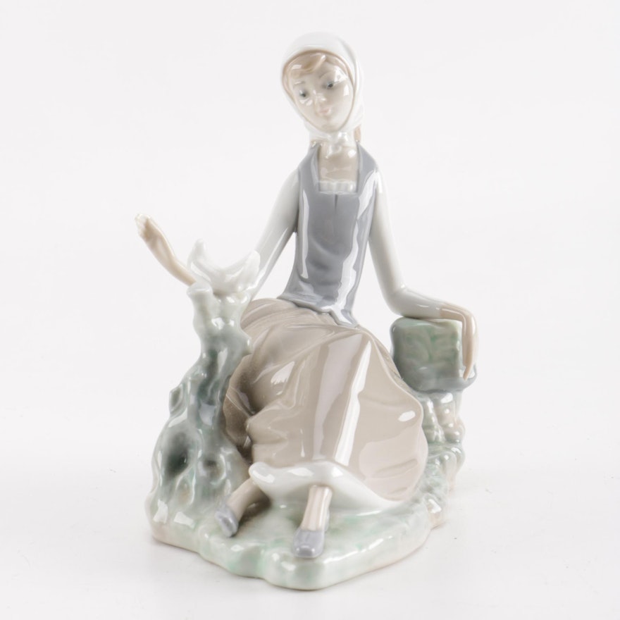 Lladro "Girl With Dove" Figurine