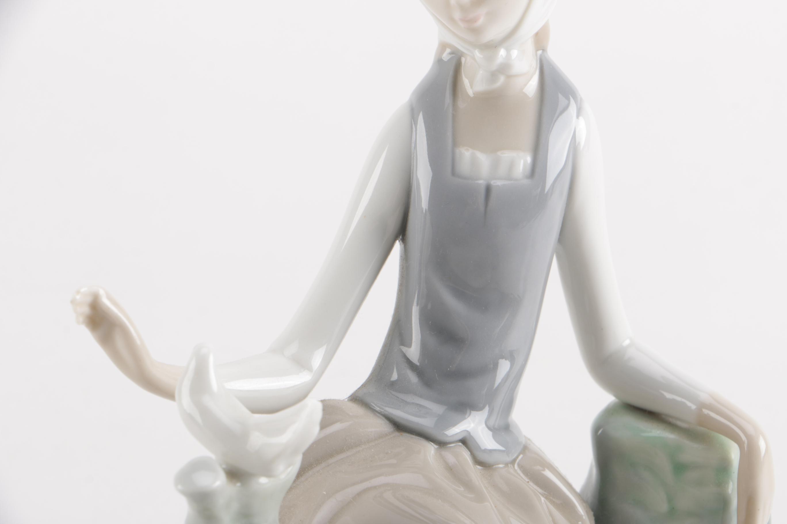 Lladro "Girl With Dove" Figurine