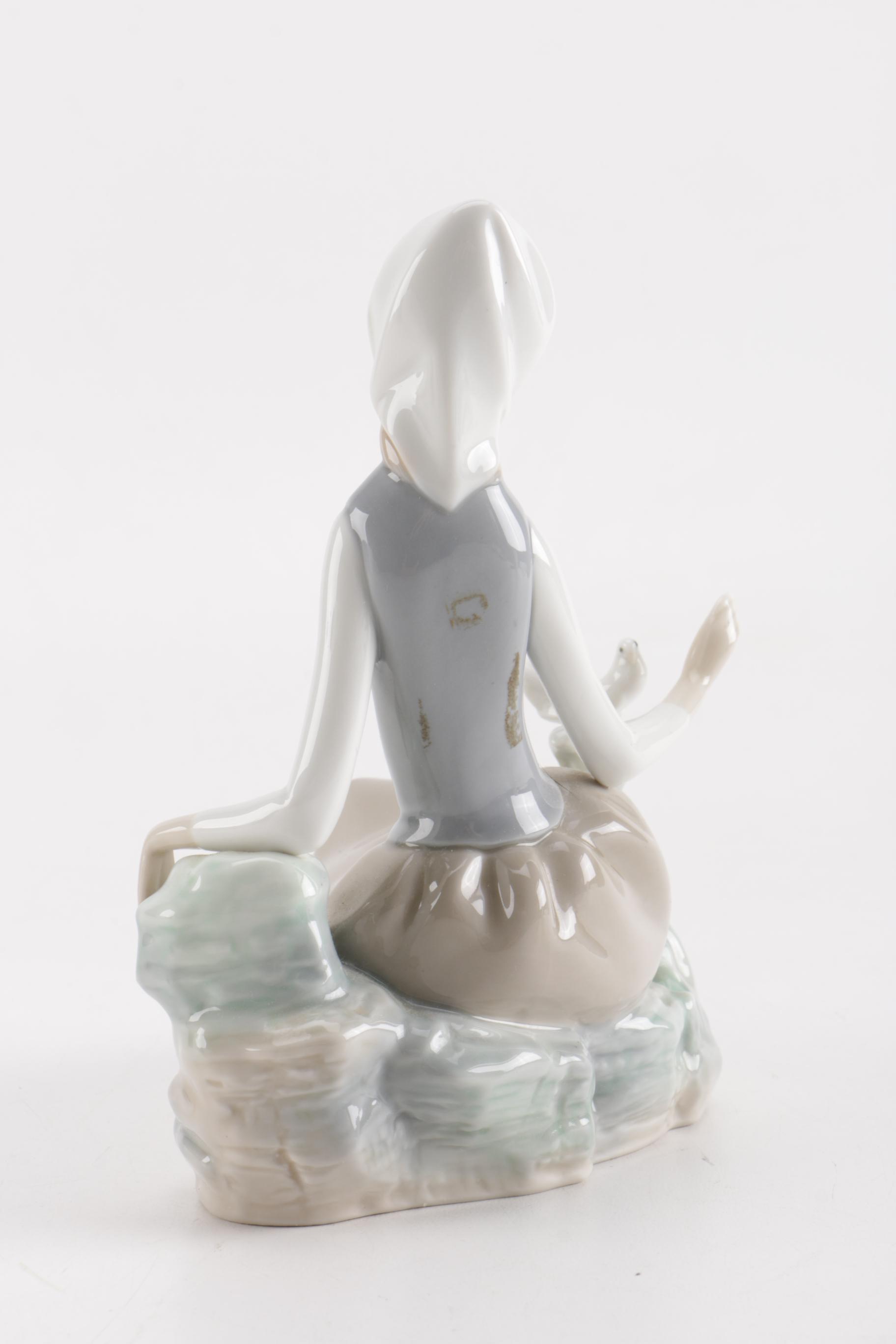 Lladro "Girl With Dove" Figurine