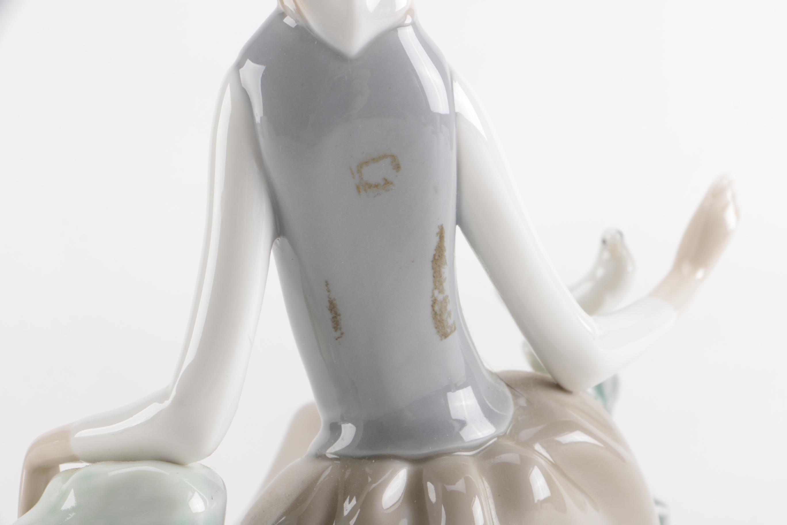 Lladro "Girl With Dove" Figurine