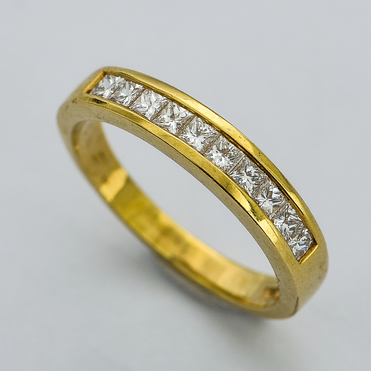14K Yellow Gold and Invisible Set Diamond Band by Shane Company