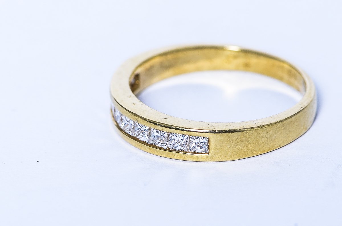 14K Yellow Gold and Invisible Set Diamond Band by Shane Company