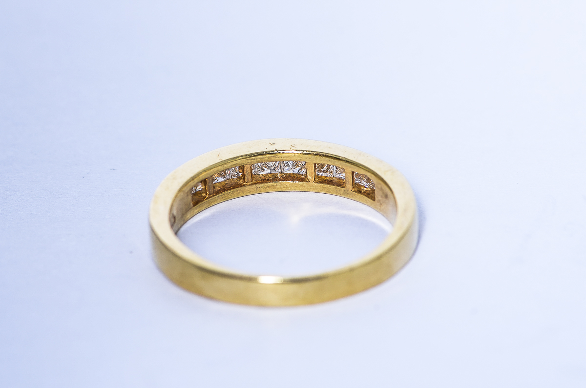 14K Yellow Gold and Invisible Set Diamond Band by Shane Company