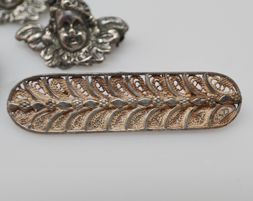 Victorian 835 Silver Cherub Brooches, 925 Bar Brooch and Southwest Style 800 Circular Brooch