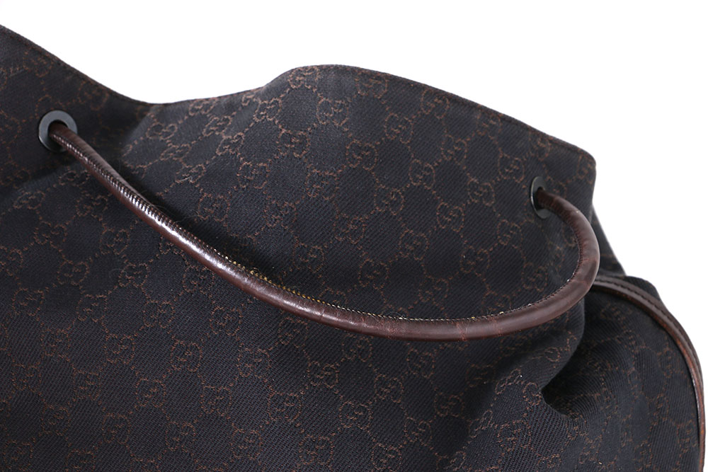 Gucci Monogrammed Canvas Drawstring Hobo Bag