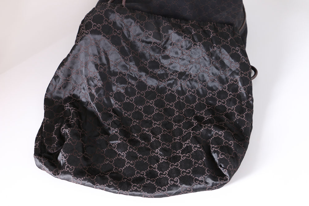 Gucci Monogrammed Canvas Drawstring Hobo Bag