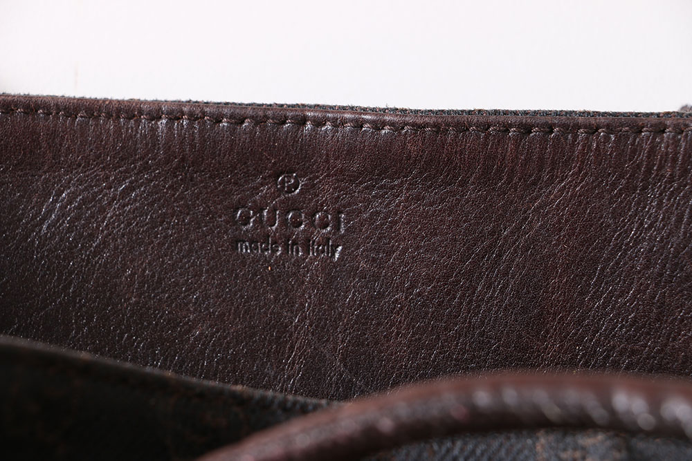 Gucci Monogrammed Canvas Drawstring Hobo Bag