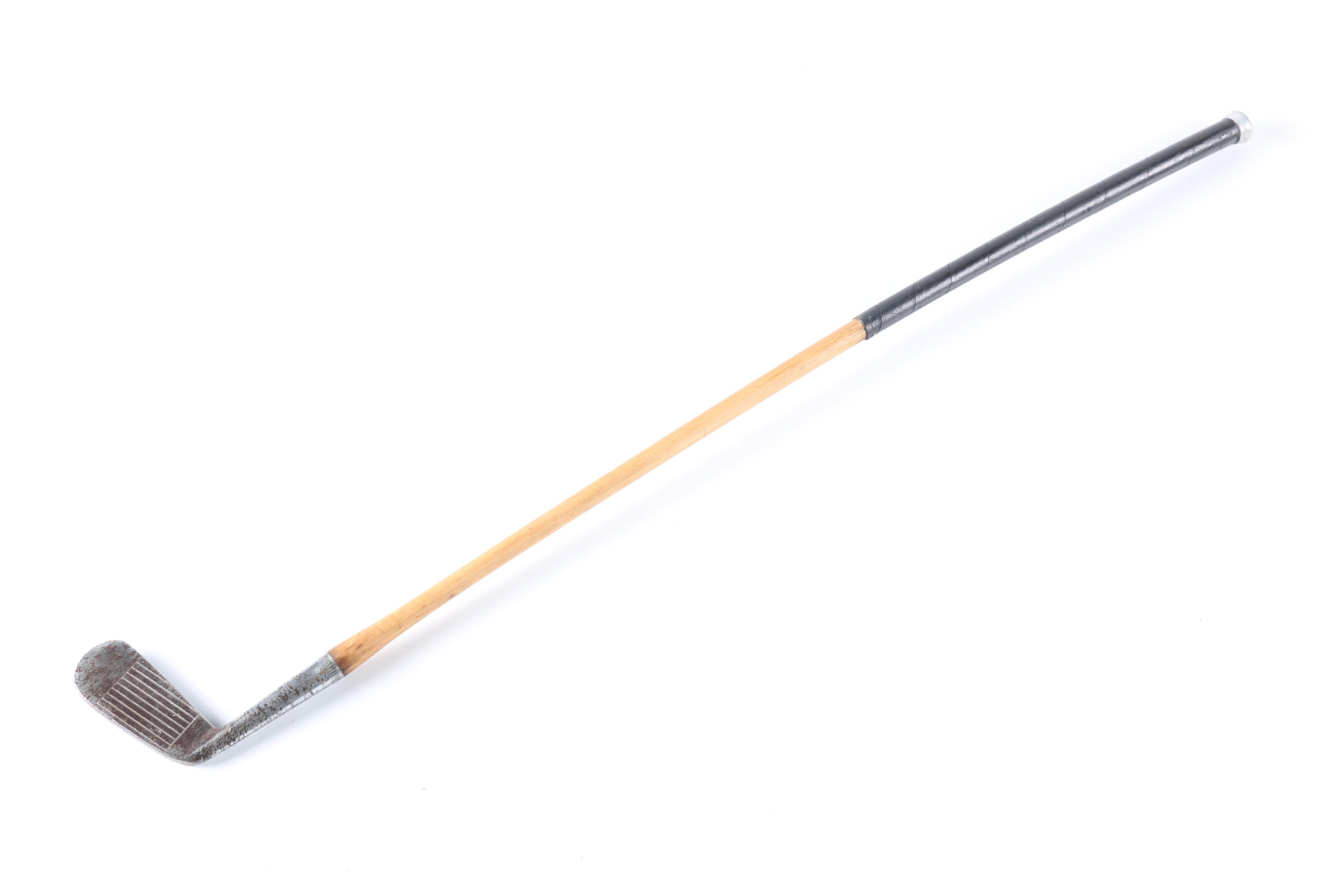 Vintage Tennis Rackets and Golf Clubs