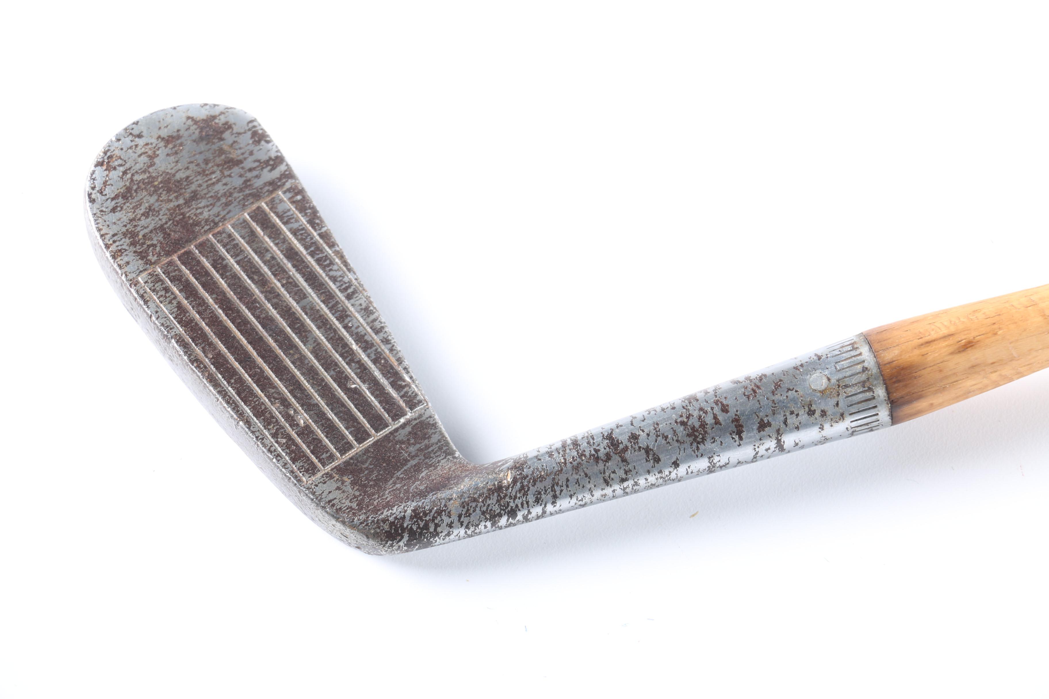 Vintage Tennis Rackets and Golf Clubs