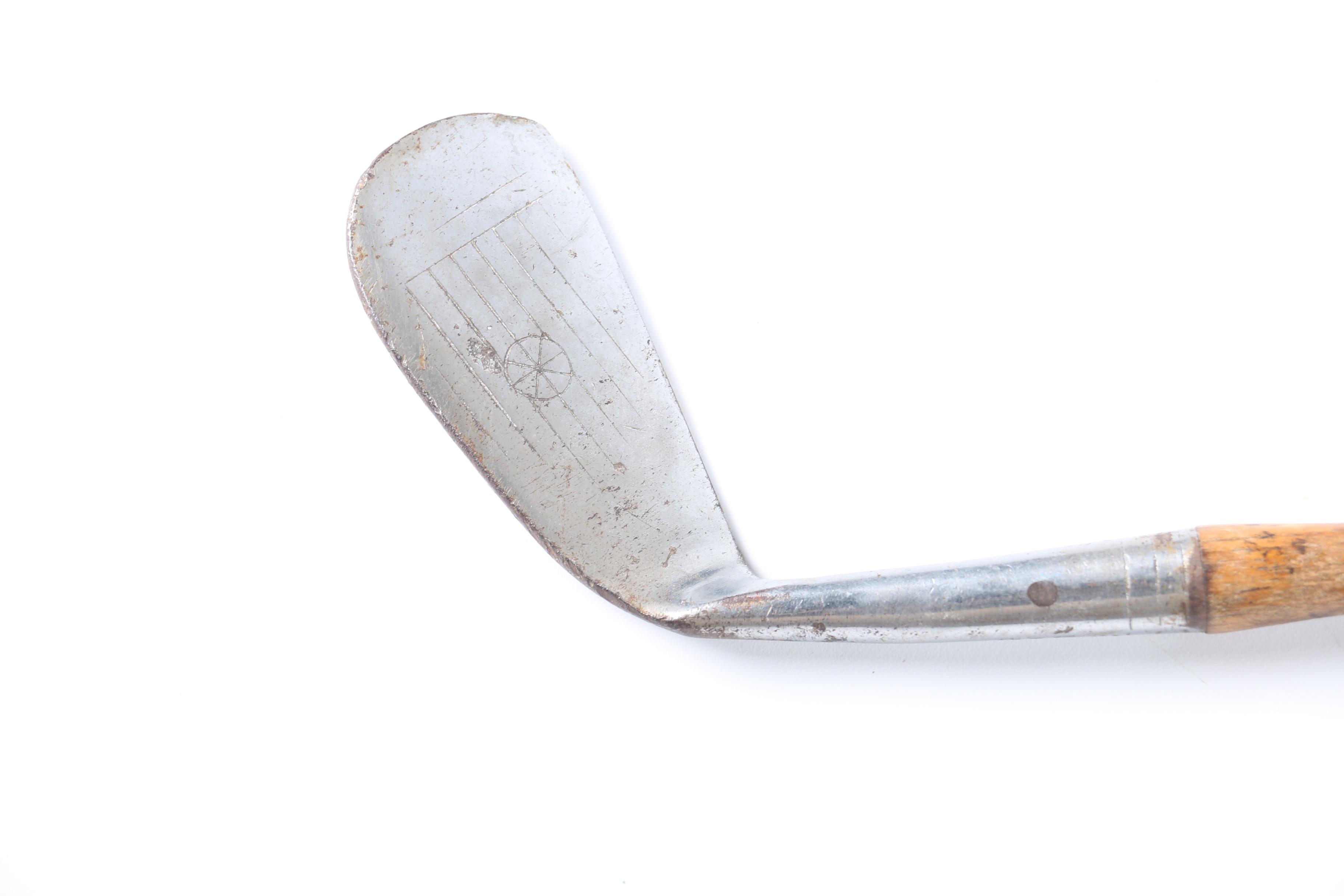 Vintage Tennis Rackets and Golf Clubs