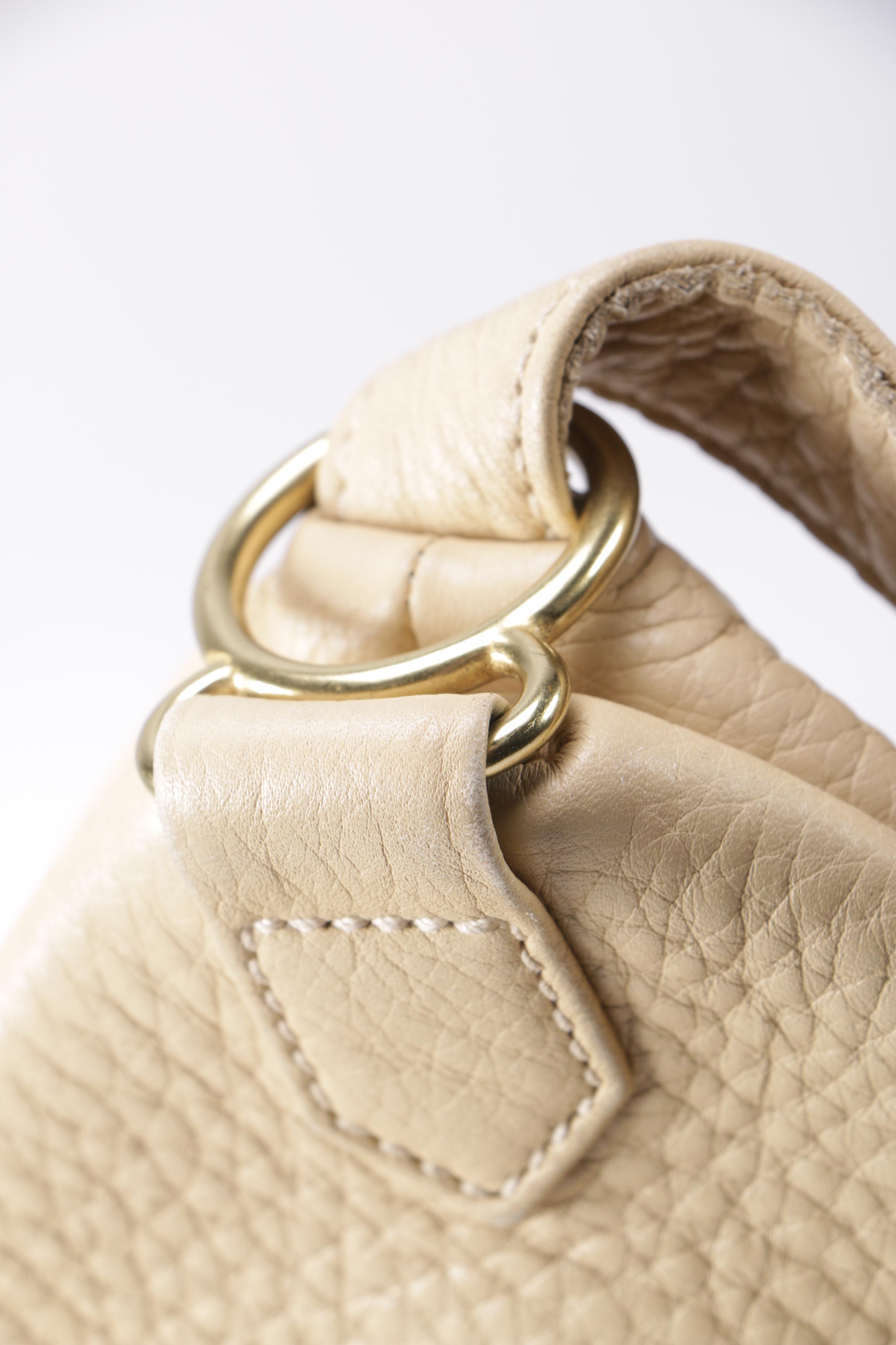 Coach Pebbled Leather Sling Backpack Bag