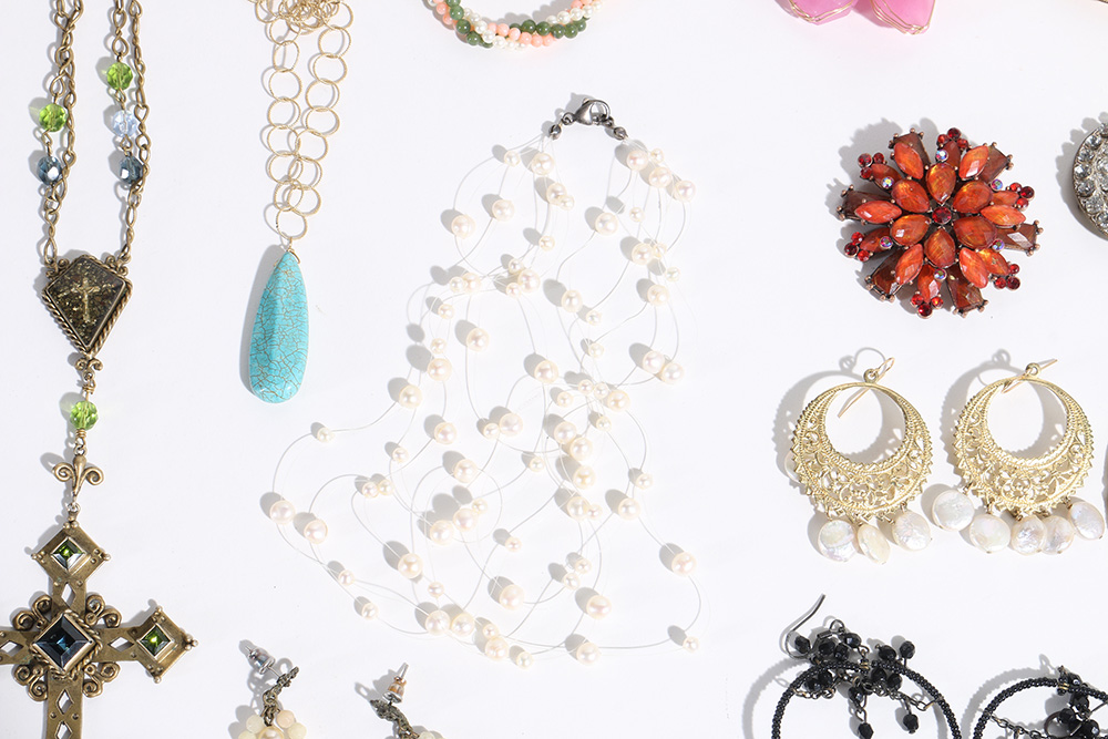 Costume Jewelry Assortment Featuring Virgins, Saints and Angels