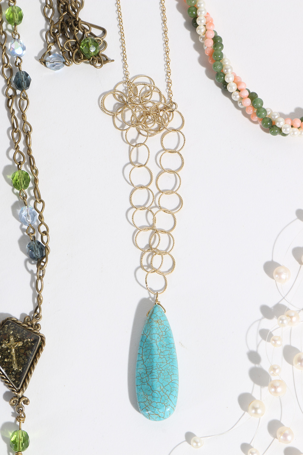 Costume Jewelry Assortment Featuring Virgins, Saints and Angels