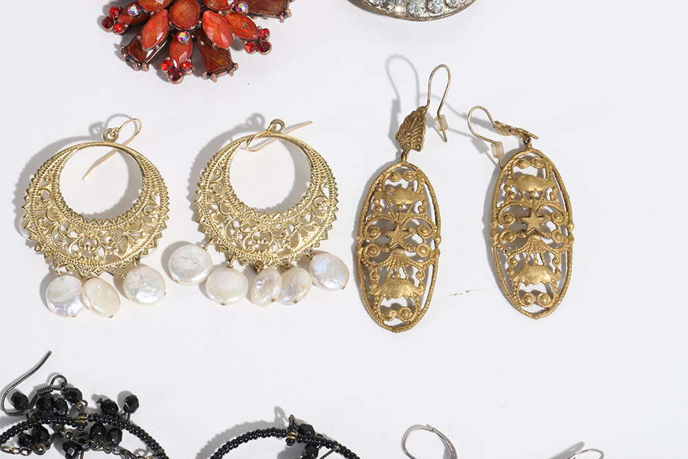 Costume Jewelry Assortment Featuring Virgins, Saints and Angels