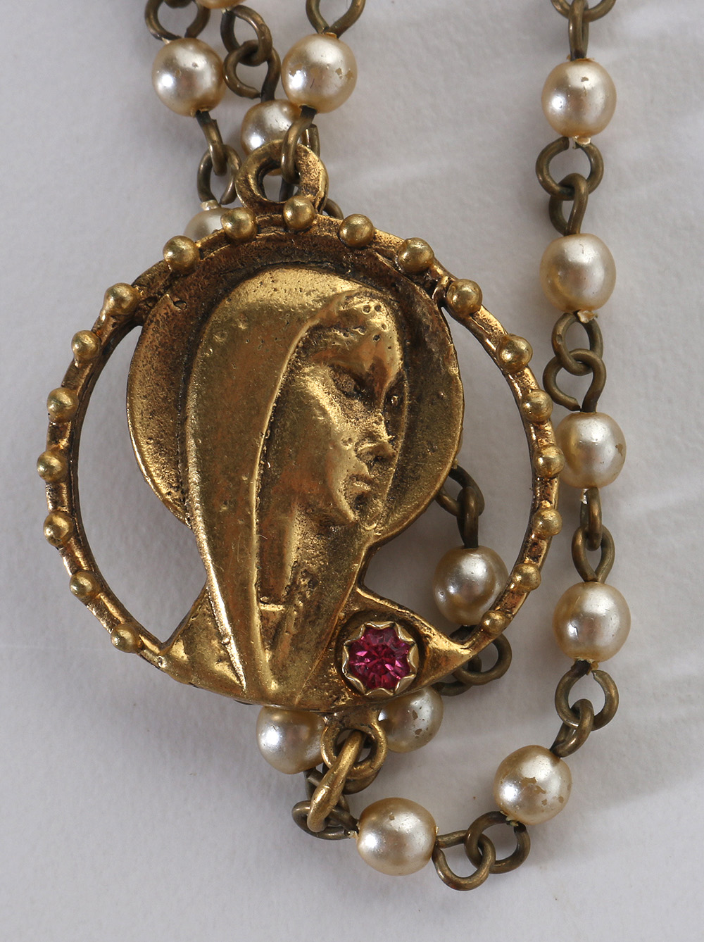 Costume Jewelry Assortment Featuring Virgins, Saints and Angels