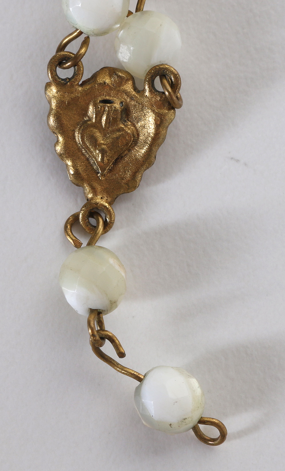 Costume Jewelry Assortment Featuring Virgins, Saints and Angels