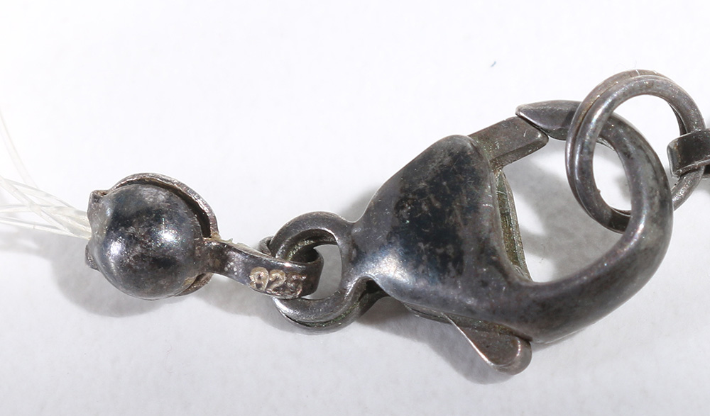 Costume Jewelry Assortment Featuring Virgins, Saints and Angels