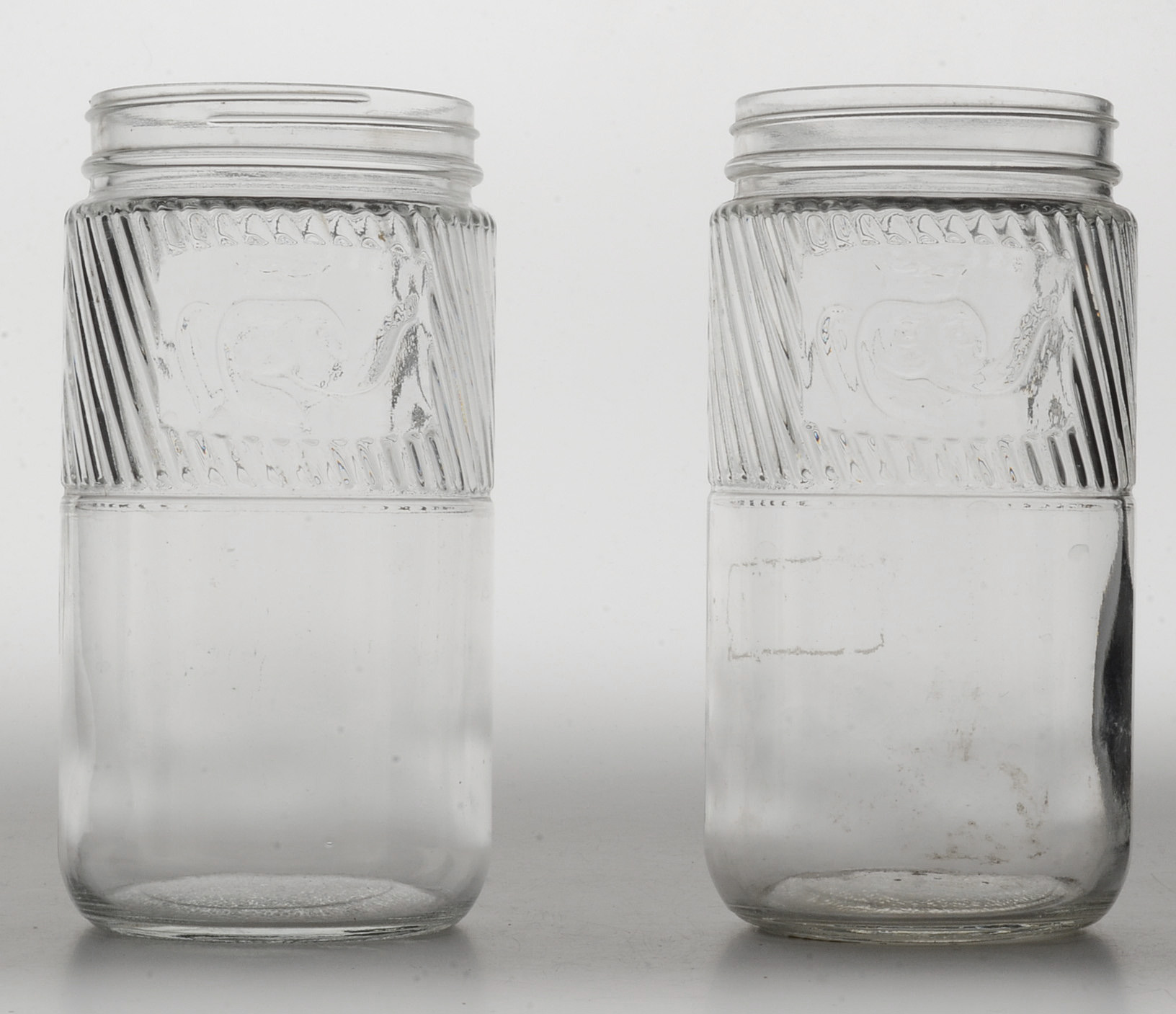 Collection of Jumbo Peanut Butter Jars and Drinking Glass