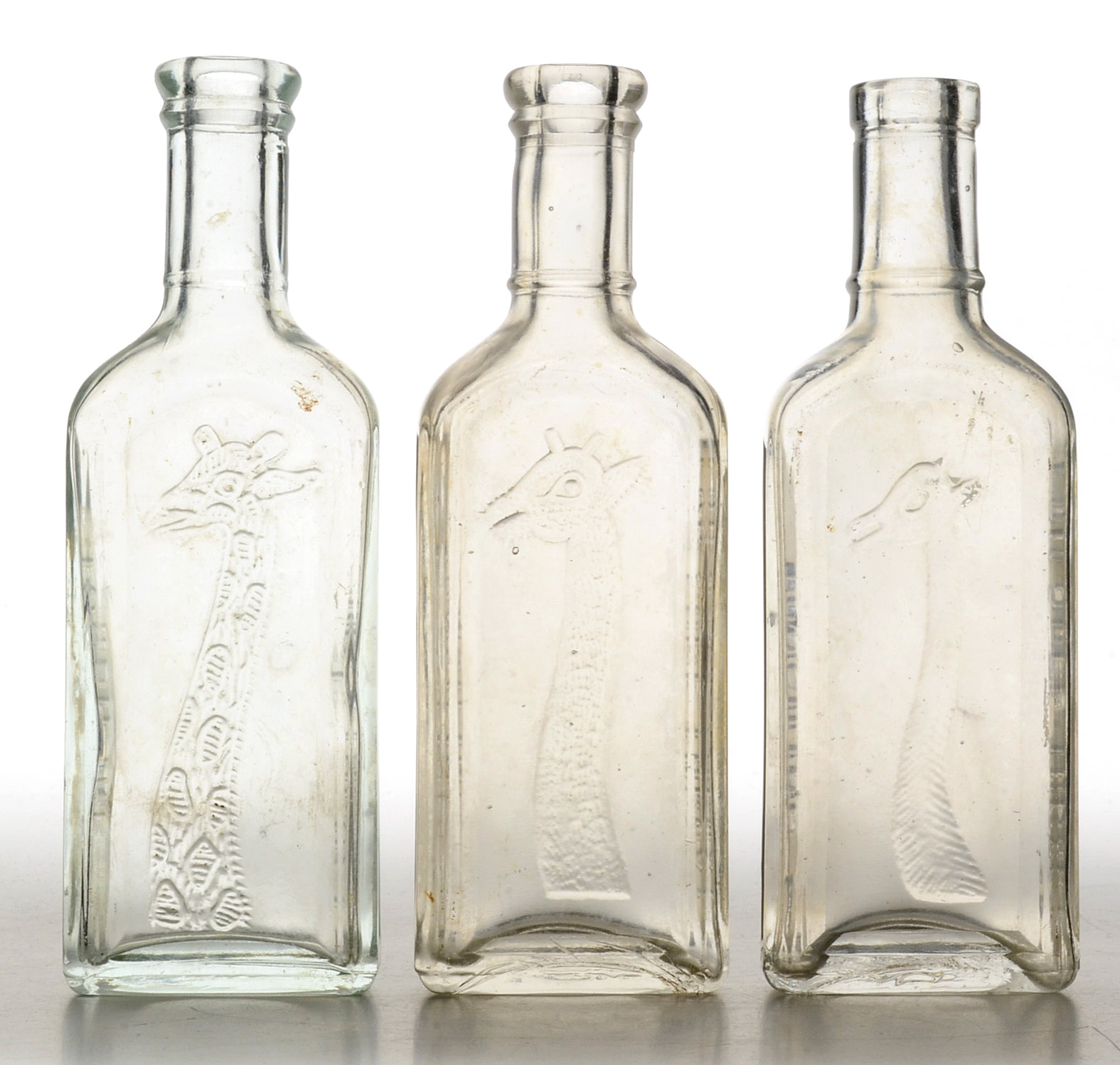 Collection of Antique Tonsiline Glass Medicine Bottles