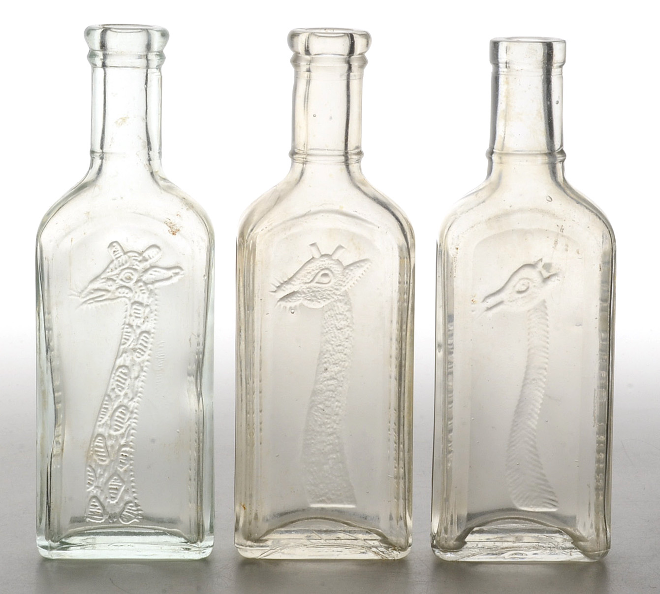 Collection of Antique Tonsiline Glass Medicine Bottles