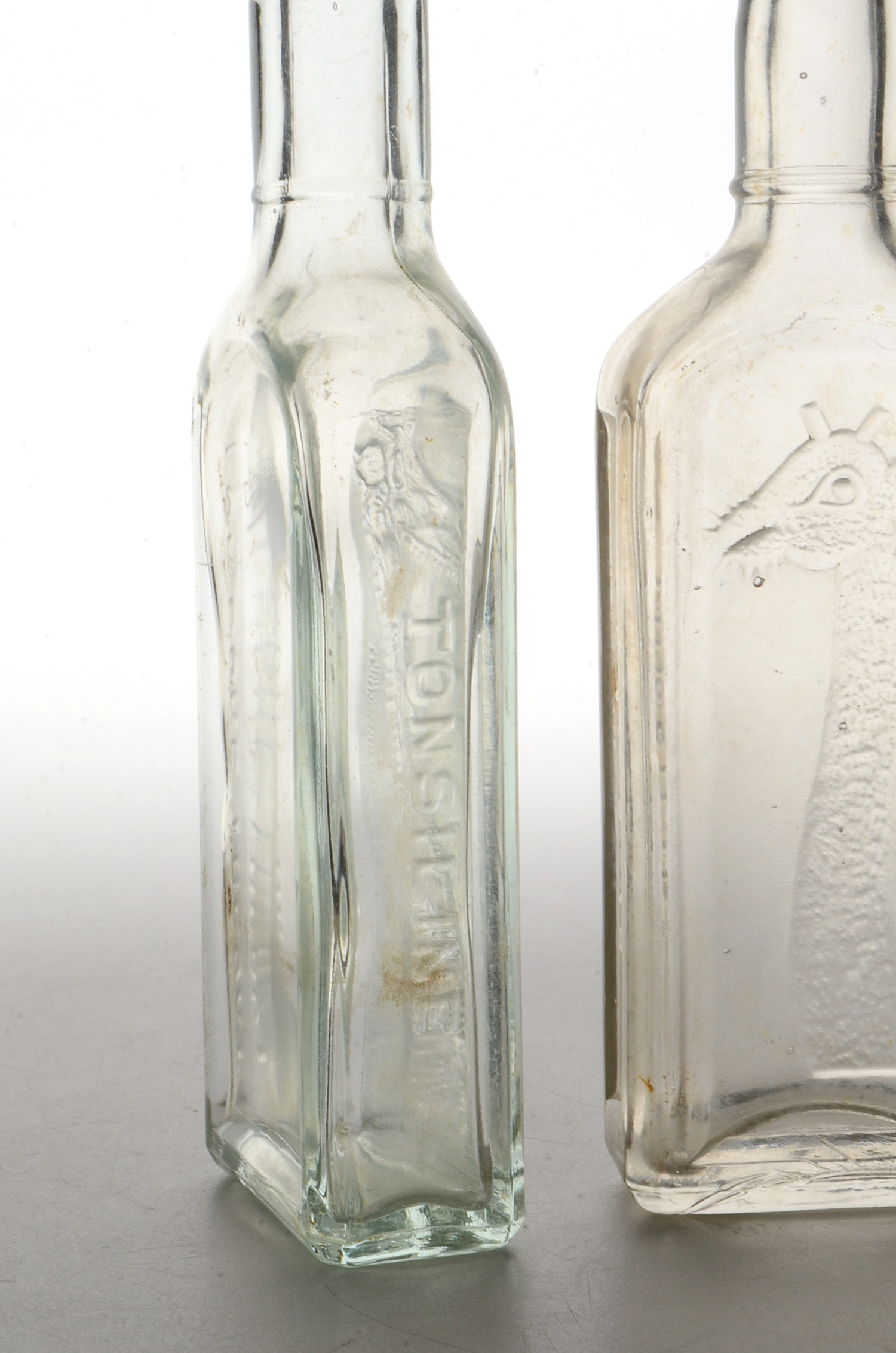 Collection of Antique Tonsiline Glass Medicine Bottles