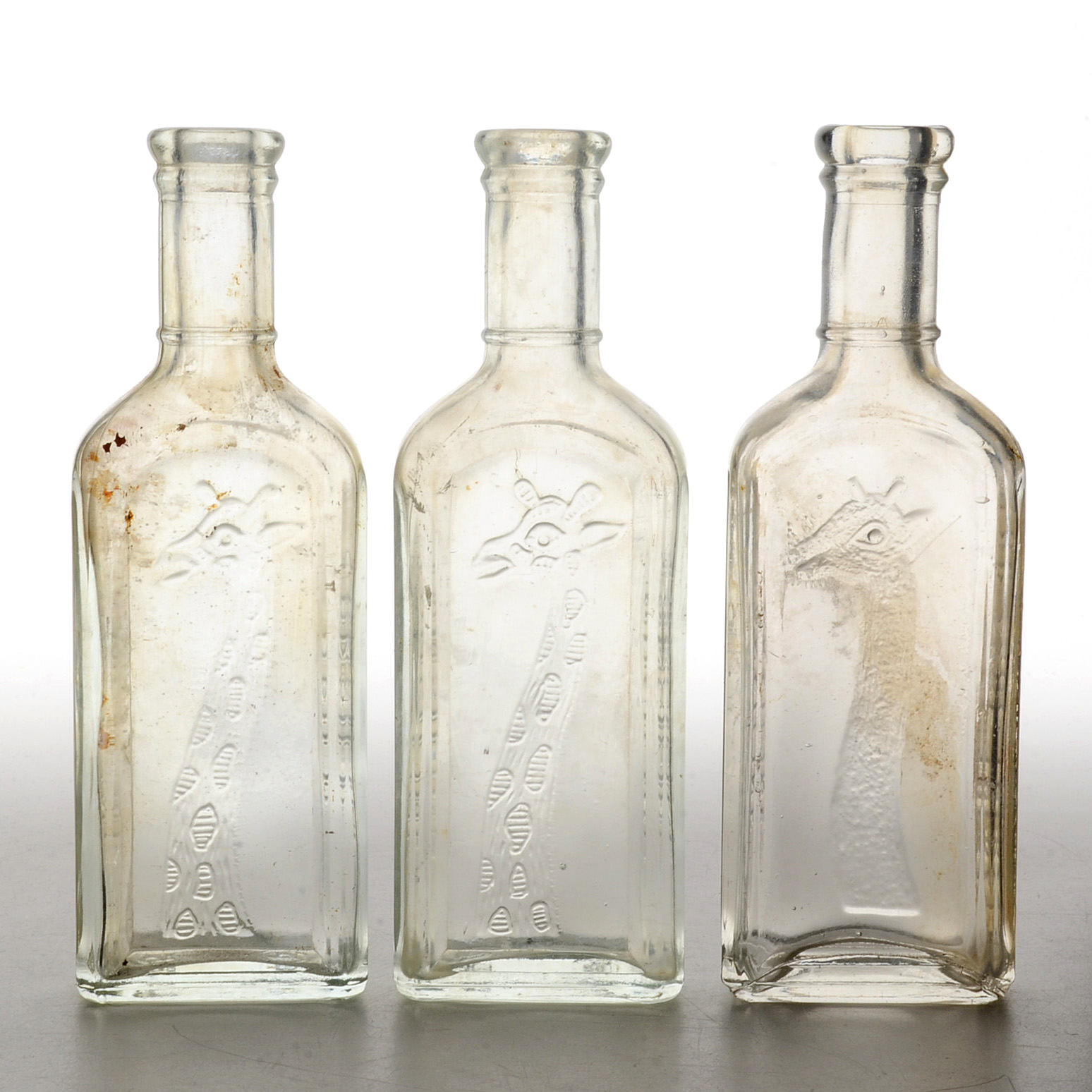 Collection of Antique Tonsiline Glass Medicine Bottles