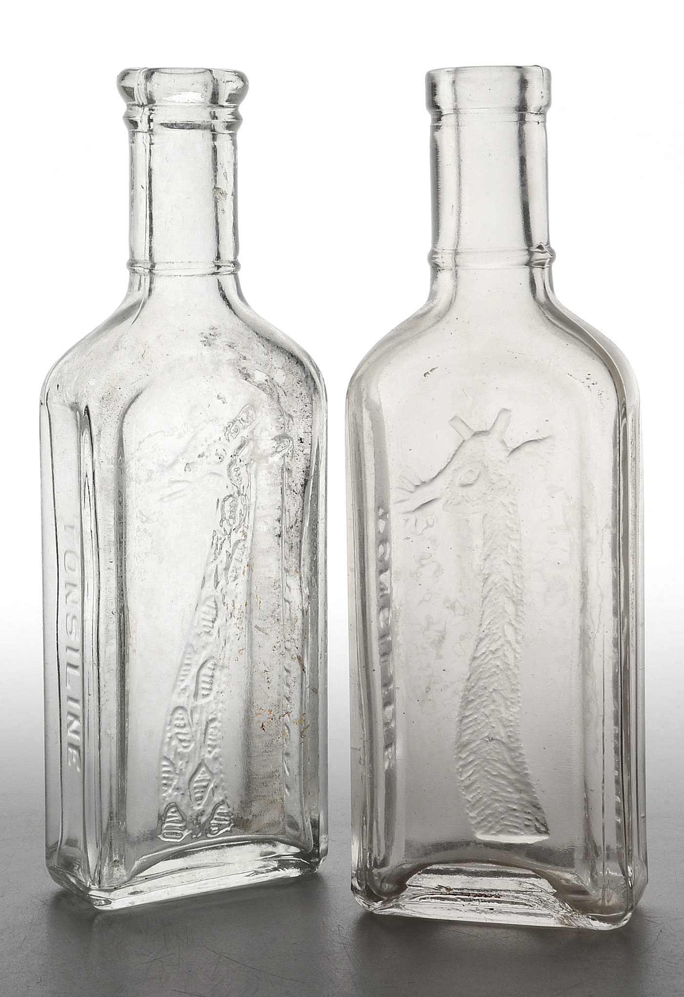 Collection of Antique Tonsiline Glass Medicine Bottles