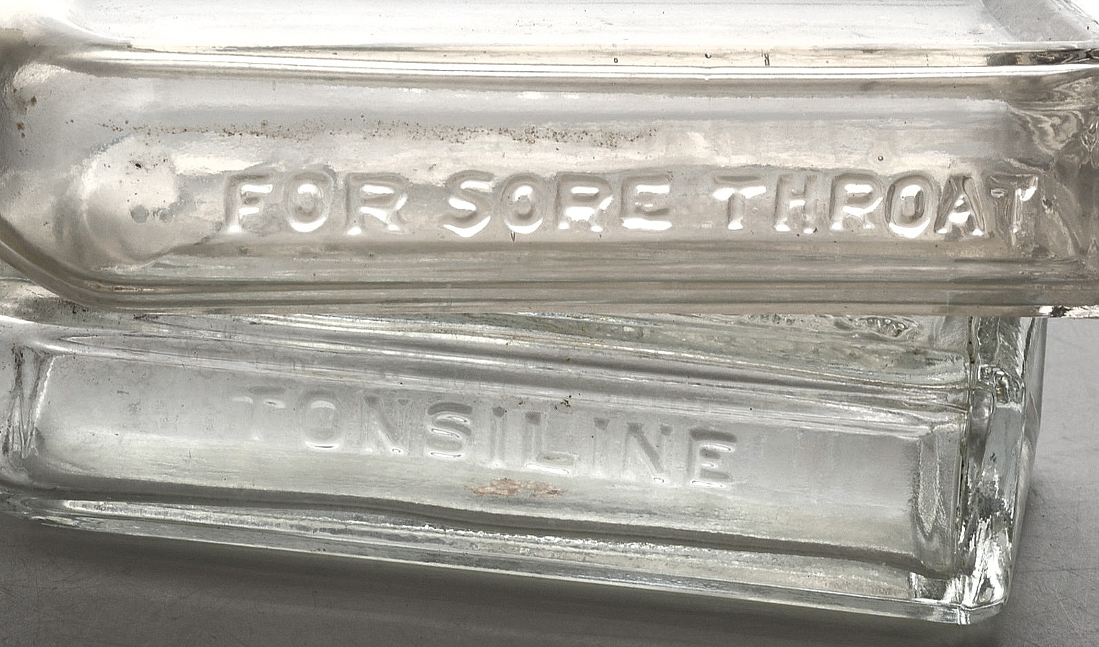 Collection of Antique Tonsiline Glass Medicine Bottles