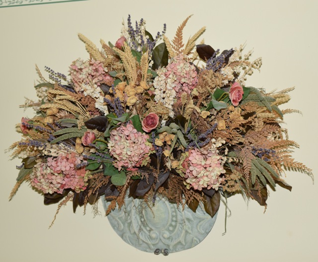 Metal Wall Pocket and Faux Floral Arrangement