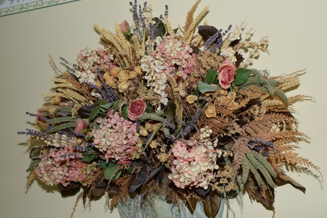 Metal Wall Pocket and Faux Floral Arrangement