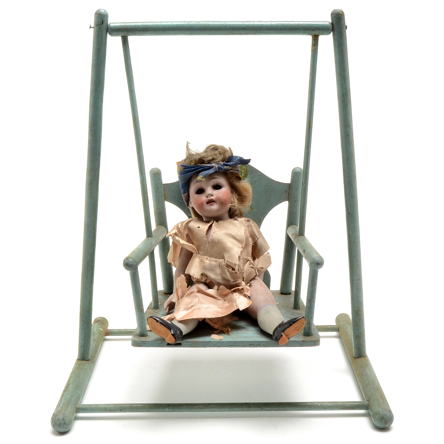 Antique Porcelain Doll on Swing