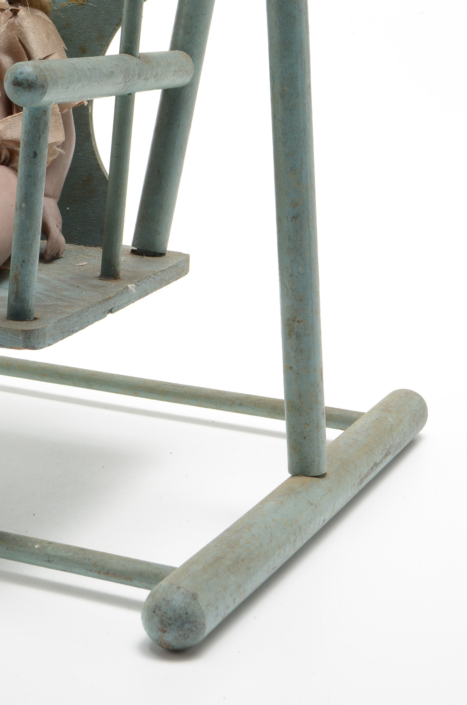 Antique Porcelain Doll on Swing