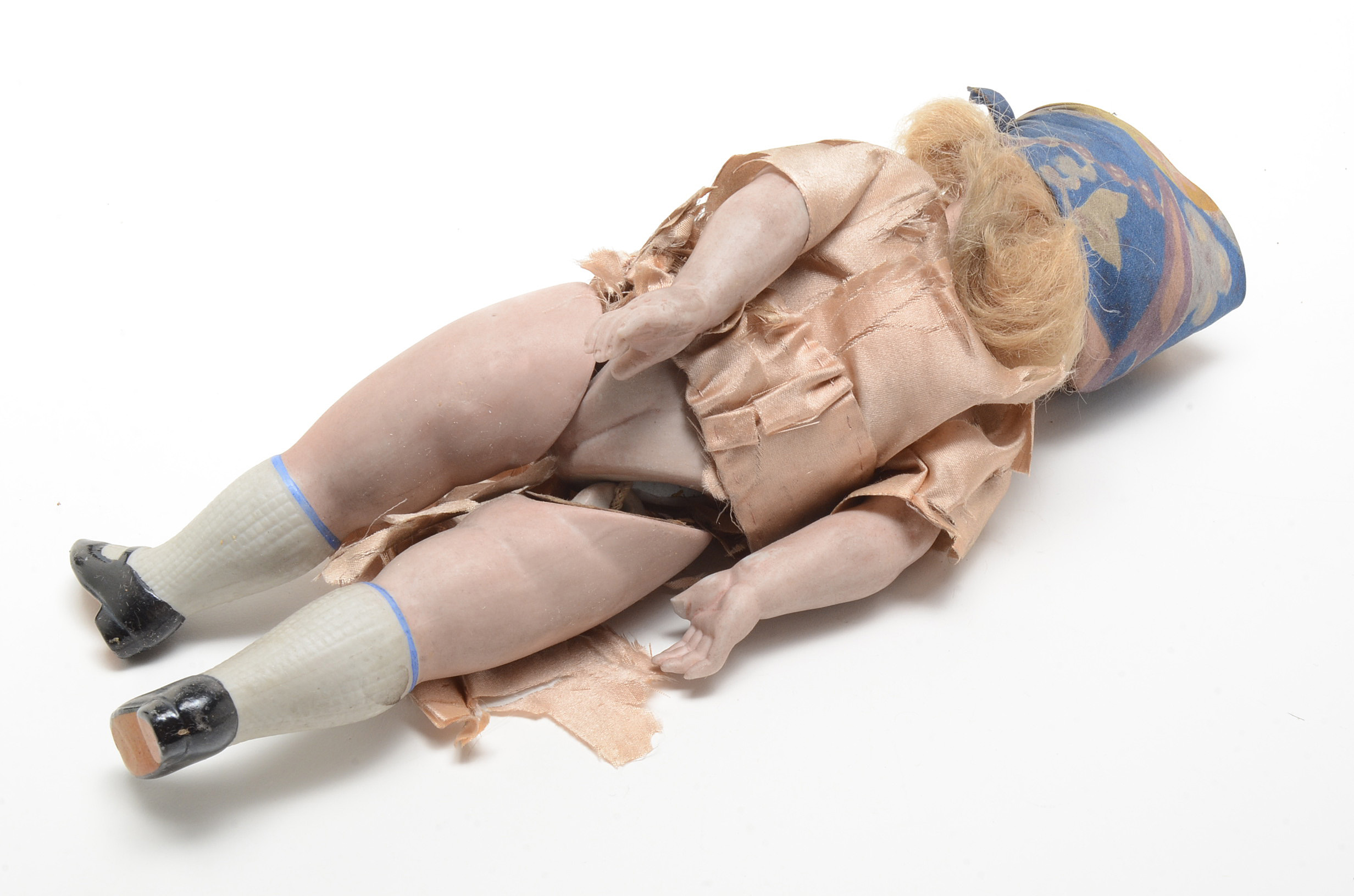Antique Porcelain Doll on Swing