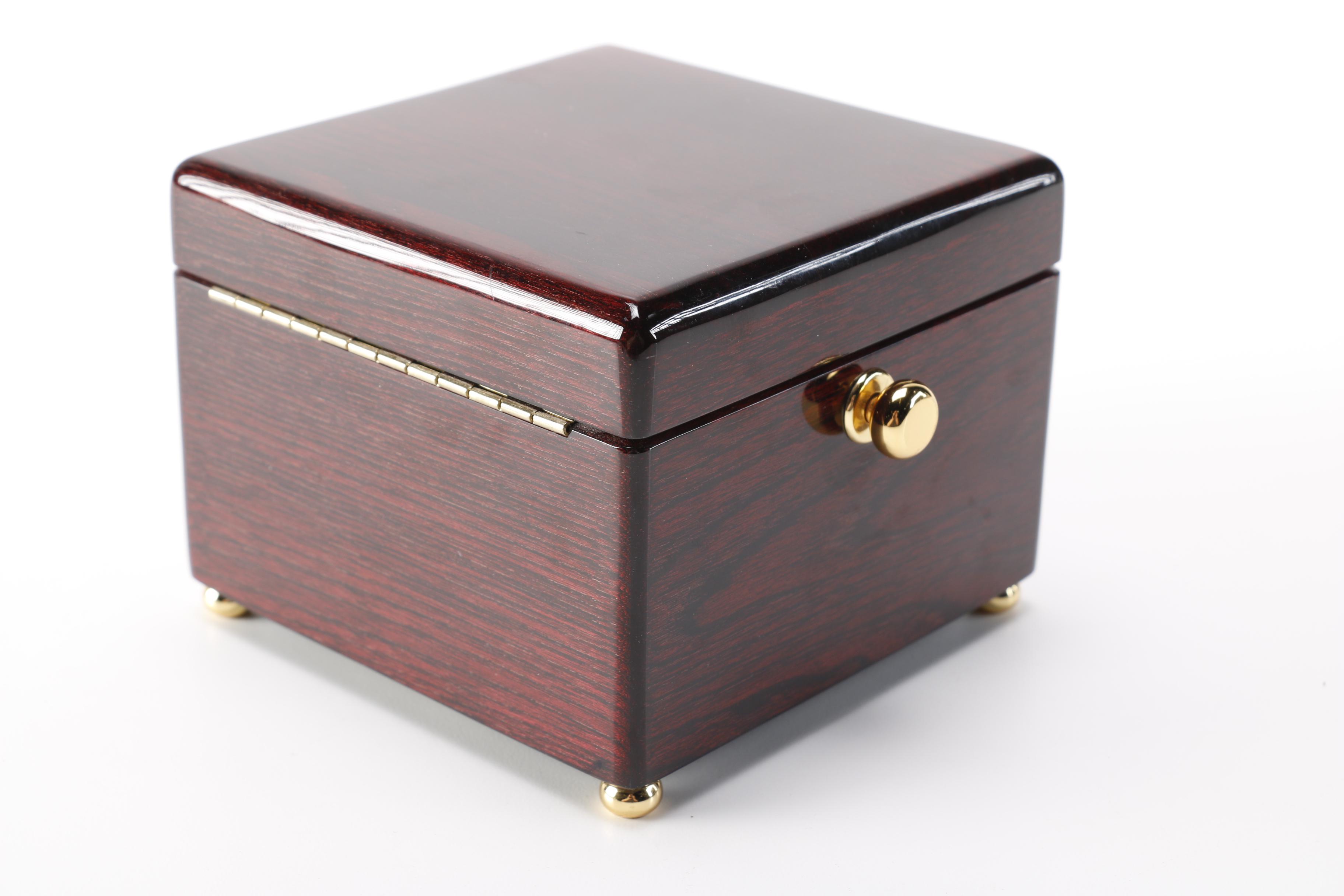 Staiger Mantel Clock and Howard Miller Navigator Clock