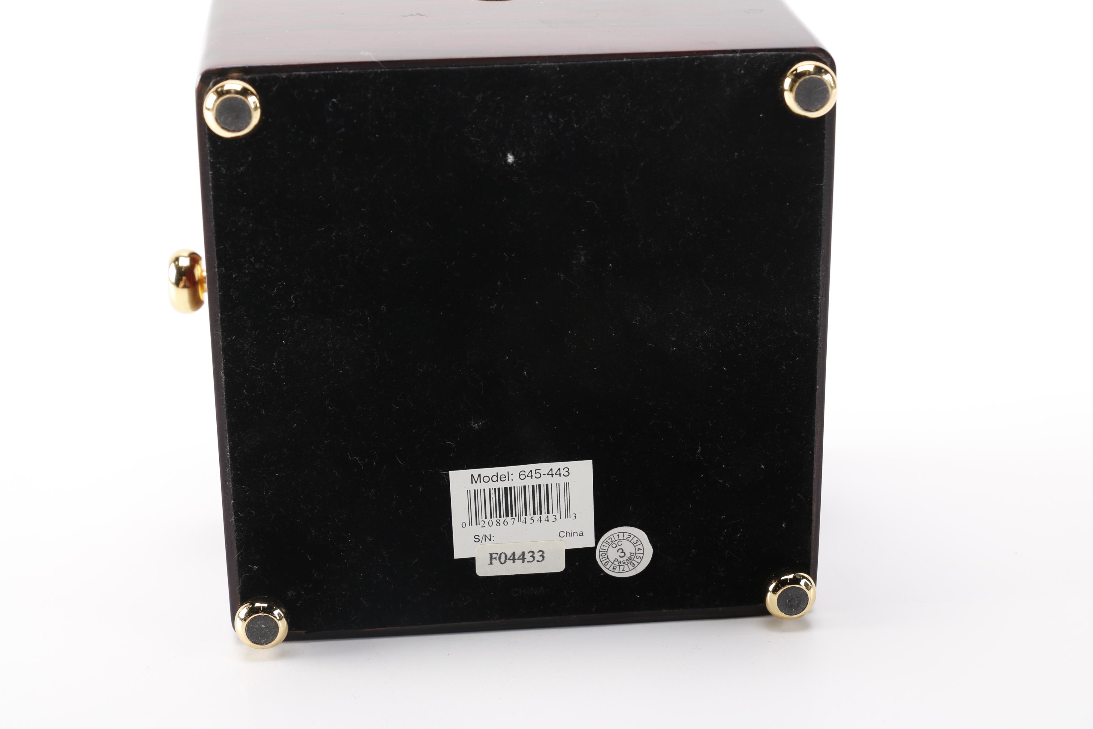 Staiger Mantel Clock and Howard Miller Navigator Clock