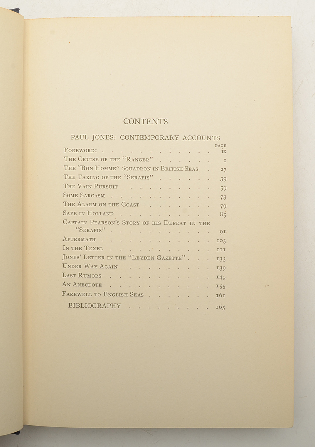 Collection of Vintage Books and Mounted Photographs